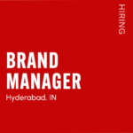 Red poster announcing a full-time, work-from-office Brand Manager role in Hyderabad, India, with the word 'HIRING' on the right and the website at the bottom left.