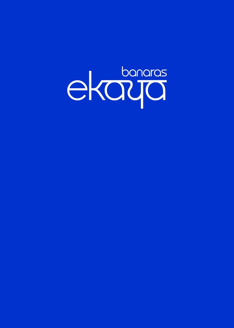 Brand logo with 'banaras' above a white stylized 'ekaya' on a solid royal blue background.